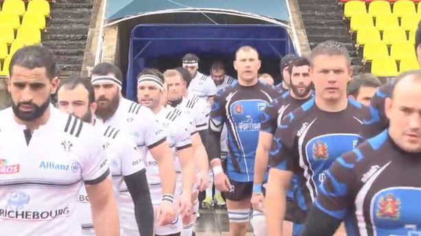 Derrière son capitaine Saïd Hirèche, les joueurs du CA Brive rentrent sur le terrain du Yug Stadium pour affronter Enisei à Sotchi